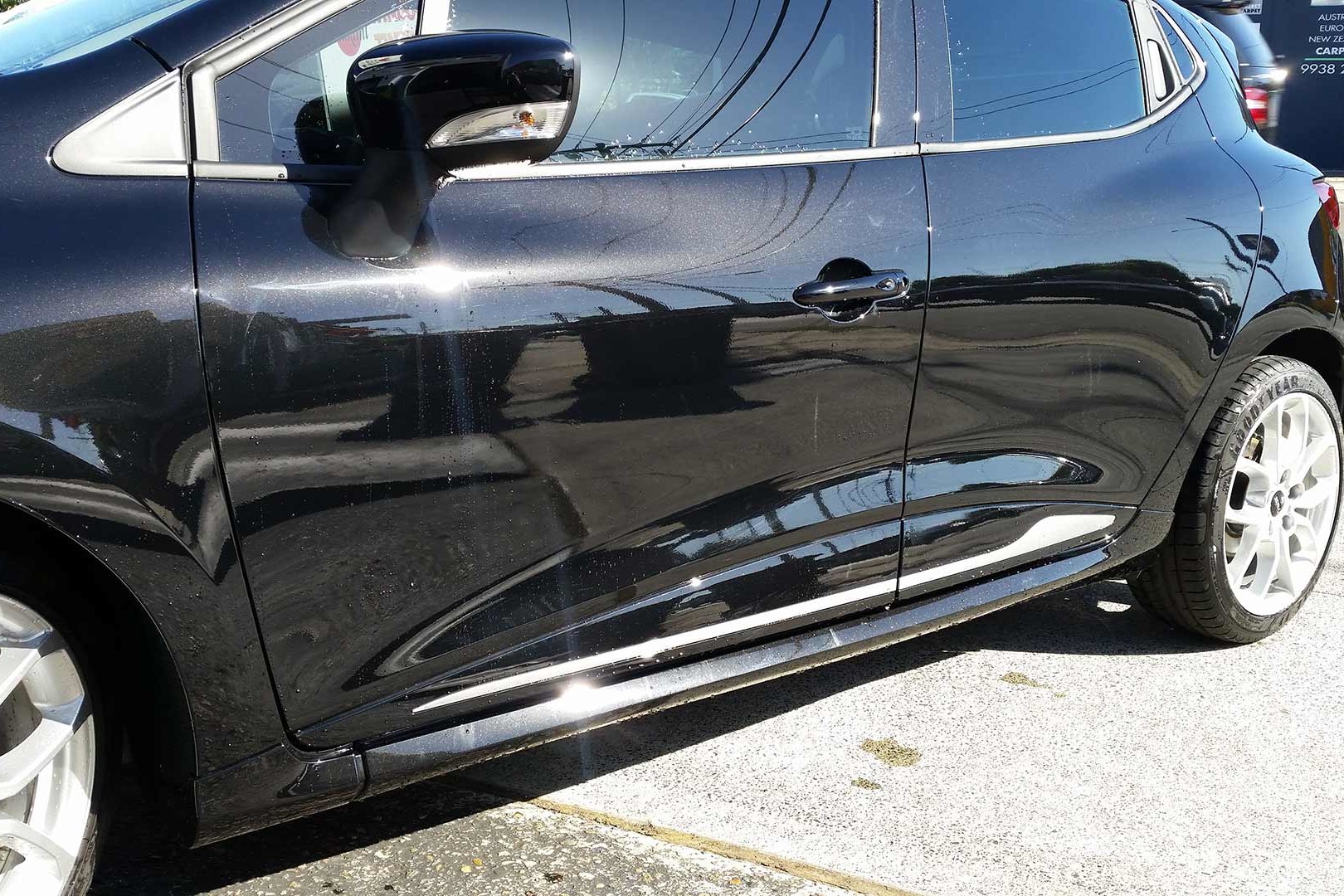 Before our paint refinishing process takes place... brought to us to remove buffer trail this black Renault just needed a little TLC!